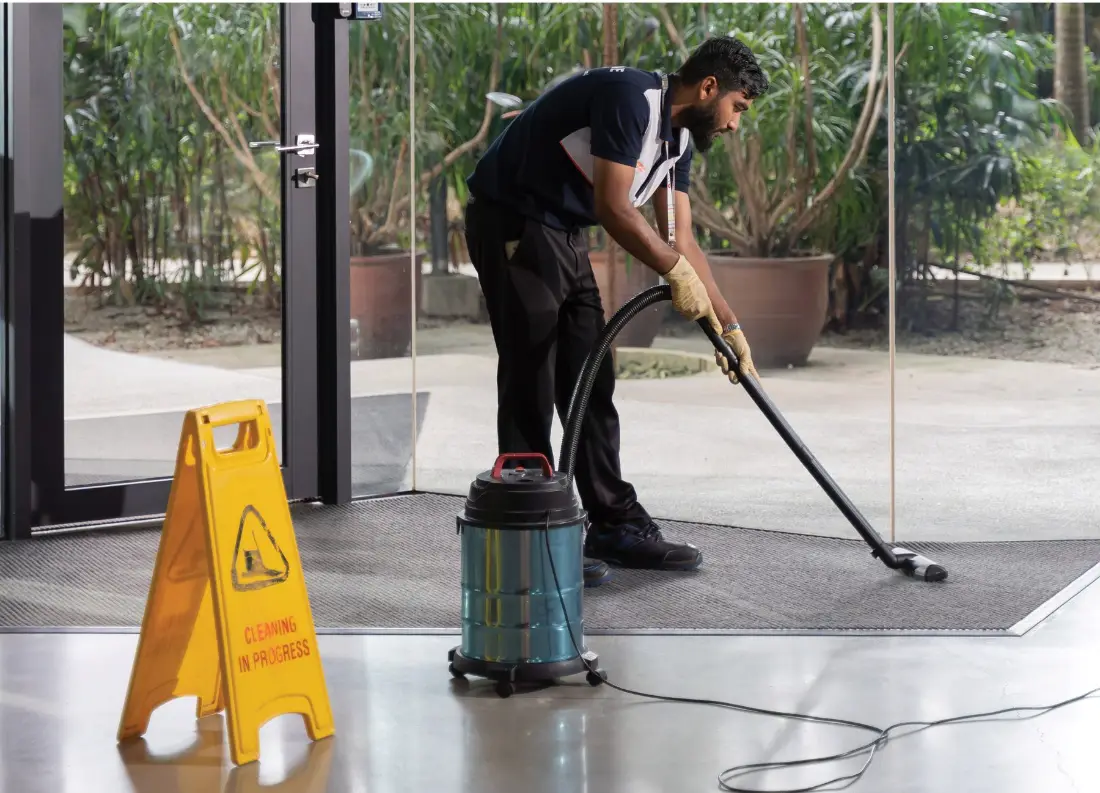 Routine entrance and carpet vacuuming at a commercial lobby